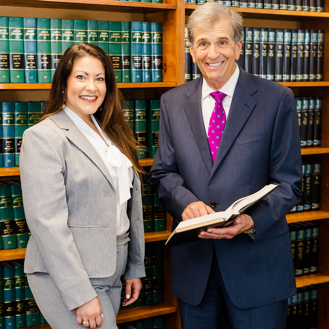 Katie Ogle and Farrell Levy of McDonald, Levy & Taylor - Workmans' Comp Attorneys
